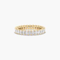 14K Yellow Gold Radiant Cut Diamond Eternity Ring (2 CTW H-I / SI1-SI2). This timeless eternity ring features the boldness and intense sparkle of radiant cut diamonds. A classic, tailored shared prongs setting allows the maximum amount of the diamonds surface to show. Number of diamonds and carat total weight will vary depending on ring size. Rings Mens Wedding Bands, Diamond Eternity Ring, Carved Ring, Classic Wedding Rings, Platinum Wedding Rings, Pink Sapphire Ring, Round Cut Engagement Rings, Radiant Cut Diamond, Diamond Anniversary Rings