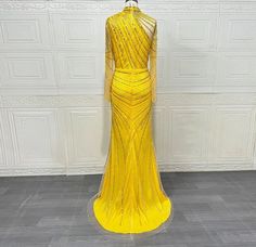 Yellow Mermaid Beading High-Neck Long Sleeves Handmade Gowns Details: Fabric Type: TENCEL Pattern Type: others Age-targeted: All age Neckline: high Train: Court Train Style: Exquisite Material: Polyester Actual Images: Yes Sleeve Style: regular is_ customized: No Waistline: Natural Silhouette: Trumpet / Mermaid Occasion: Formal Evening Decoration: Beading Sleeve Length(cm): Full Dresses Length: Floor-Length Model Number: Pm10157 Built-in Bra: Yes Item Type: Evening Dresses Fashion Element: beads Yellow Embellished Fitted Gown, Fitted Yellow Embellished Gown, Yellow Mermaid, Floral Prom Dresses, Evening Dress Fashion, Full Dress, High Neck Long Sleeve, Prom Gown, Jacket Outfits