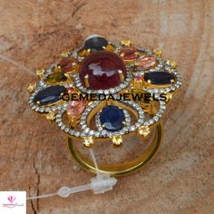 Ruby Diamond Ring, Sapphire Silver Ring, Multi-Stone Ring, Pave Diamond, Gemstone Silver Jewelry, 925 Silver Jewelry, Gold Plated Ring, Gift Gross Weight: 11.97 gram Gemstone Weight: 10.94 cts Diamond Weight: 1.10 cts NOTE:- All The Products Are Designed And Manufactured In My Workshop By Me & My Team. Shown Products Are Purely Handmade. Custom Orders Are Open Handly Accepted. We Are the Perfect Choice For Any Custom Jewelry Manufacturing. For Bulk Orders Please Message me. Visit My Store Fo Ring Saphir, Sapphire Silver Ring, Jewelry Manufacturing, Ruby Diamond Ring, Pave Diamond Jewelry, Purple Amethyst Ring, Diamond Rings Design, Ring Sapphire, Ruby Diamond Rings