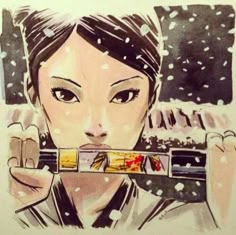 a drawing of a woman looking through a window with snow falling all over her face