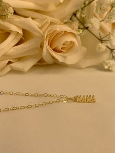 This dainty 14K Yellow Gold Filled Mama necklace is a sweet addition to your jewelry box. Featuring a classic design, this necklace can be worn every day or teamed with your favorite cocktail attire. Hypoallergenic Water Resistant Hand made with love Charm size 15mm x 4mm Mama Necklace, Cocktail Attire, Love Charms, Gold Filled Chain, 14kt Gold, Made With Love, Charm Necklace, Gold Filled, With Love