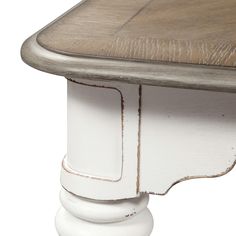 a close up of a white table with wood on the top and bottom part of it