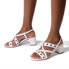 Size 38 Summer Sandals With Reinforced Flat Heel, White Block Heels With Buckle Closure And Round Toe, White Block Heels With Buckle And Round Toe, White Round Toe Block Heels For Spring, Vacation Block Heels With Round Toe, White Block Heels With Round Toe, White Cushioned Heels For Vacation, Low Heel Padded Vacation Heels, White Low Heel Sandals For Beach