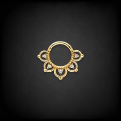 a gold ring with diamonds on it