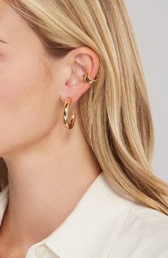 Complete your look with the understated modern style of this collection of mixed metallic hoops and ear cuffs. Set includes two pairs of hoop earrings and two ear cuffs Hoop earrings have post back Goldtone plate/rhodium plate Imported Elegant Hoop Ear Cuff For Everyday, Elegant Everyday Hoop Ear Cuff, Classic Hoop Single Ear Cuff, Classic Hoop Ear Cuff Single Earring, Elegant Hoop Ear Cuff With Ear Wire, Metal Hoop Ear Cuff, Modern Hoop Ear Cuff With Ear Wire, Minimalist Metal Hoop Ear Cuff, Minimalist Yellow Gold Open Circle Hoop Earrings