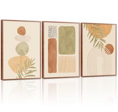 three framed art pieces with different shapes and colors on the same wall, one has a plant