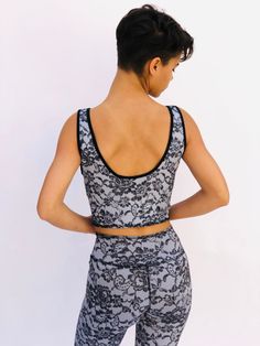 These comfortable and cute cropped bralets can be worn with the matching sports bra for added support. Paired with one of the many matching shorts, this top can be worn in the studio, as a bathing suit or out on the street. double sided with 2 different yet complimenting prints, made from recycled water bottles and spandex UV protection Sporty Racerback Crop Top With Built-in Bra, Casual Training Crop Top With Built-in Bra, Black Stretch Bra-friendly Crop Top, Black Seamless Gym Crop Top, Black Seamless Crop Top For Gym, Breathable Crop Top For Pilates, Black Cropped Activewear With Built-in Bra, Black Yoga Crop Top With Bust Support, Black Activewear Crop Top With Built-in Bra