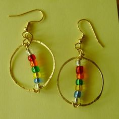 Earrings Colorful Hand Tooled Hammered Glass by GypsythatIwas, $12.00 Spring Things, Earrings Bead, Earrings Colorful, Rainbow Glass, Artisan Earrings, Diy Metal, Rainbow Earrings, Metal Work, Wire Work