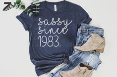 a t - shirt that says let's get baked next to some jeans and shoes