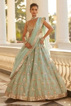 Powder blue attached cancan lehenga with all over mirror butti embroidery and sequin embellishments. Paired with a padded blouse with mirror work and dupatta with mirror work border. - Aza Fashions Sangeet Lehenga For Bride Blue, Georgette Lehenga Designs, Rahul Mishra Lehenga, Lehenga For Wedding Guest, Desi Wedding Guest Outfit, Lengha Modern, Blue Organza Lehenga, Indian Wedding Guest Outfit, Mirror Blouse