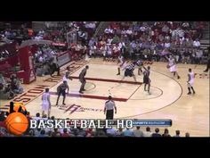 a basketball game is being played on the court with fans in the bleachers