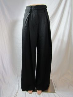 Style: wide leg trouser Belt Loops: yes Leg Type: wide Closure:zipper and button Print: NA Size: S Color: black Lining: NA Features: NA Accents:NA Fabric: poly blend Waist: 14 Rise: 13.5 Inseam: 29 CL305 Black Wide Leg Culottes For Formal Occasion, Black Formal Wide-leg Culottes, Formal Black Wide-leg Culottes, Zara Wide Leg Dress Pants For Work, Black Straight Culottes For Formal Occasions, Zara Wide Leg Office Pants, Zara Business Casual Wide Leg Pants, Zara Wide Leg Pants For Office, Zara Wide Leg Pants For Work