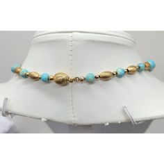 This is part of Chairish’s Costume Jewelry assortment.  1960s goldtone ovoid textured beads and round molted faux-turquoise single strand beaded necklace with push pin clasp. Marked "NAPIER" on the pin part of the clasp. Center bead measures 1/2 inch across. Interior circumference is 19 3/4 inches. Condition: Very good; minor wear if any. Adjustable Gold Turquoise Necklace With Round Beads, Gold Turquoise Necklace With Round Beads, Gold Turquoise Necklace With Round Beaded Details, Vintage Beaded Turquoise Necklace With Round Beads, Adjustable Vintage Turquoise Necklace With Round Beads, Gold Turquoise Necklace With Round Gemstone Beads, Vintage Turquoise Necklace With Round Beads Gift, Vintage Turquoise Necklace With Round Beads For Gifts, Vintage Turquoise Round Beads Necklace For Gift