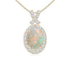 The oval opal in the center dazzles with its striking play of colors, encircled by precious white diamonds. Designed in an elaborate style in 14k yellow gold, this opal diamond pendant is sure to fascinate. Diamond accents adorn the criss cross bale for a spectacular look. Opal Pendants, Diamond Halo, White Diamonds, Halo Diamond, 18k Rose Gold, Diamond Pendant, Diamond White, Criss Cross, Halo