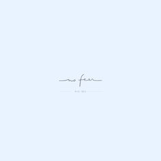 the word no fear is written in cursive handwriting on a light blue background