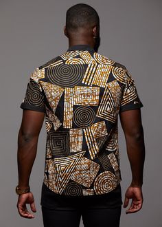 Style #M2023BBG Our unique Olu Button-Up in Black Brown Geometric is perfect for the modern man interested in looking stylish while incorporating African print. Description: 100% Cotton, African wax print with solid trimming inside collar, cuff, and top of chest pocket Designed in USA, Imported Care Instruction:Machine wash cold. Use mild detergent.Do not bleach. Hang to dry. Iron if needed Model's Information: Height: 6'0 | Size: M Black Casual Shirt With Geometric Pattern, Casual Black Shirt With Geometric Pattern, Fitted Black Top With Geometric Pattern, Black Cotton Tops With Geometric Pattern, Modern Black Printed Tops, Black Cotton Top With Geometric Pattern, Black Printed Shirt With Casual Collar, Modern Fitted Printed Tops, Black Short Sleeve Tops With Geometric Pattern