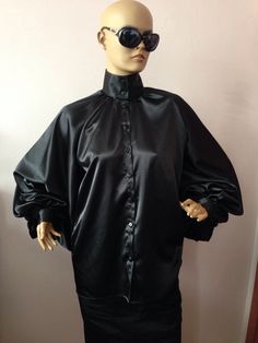 "This is a very stylish Womens Silk blouse. It is comfortable and cozy. Made for a free flowing fit. Great for all year around and for any special occasion or casual day can be dressed up or dressed down. SIZE CHART SIZE S - US 6, UK 8, EU 36 bust: bust around 34.5\"/90cm Waist: waist around 27.5\"/70cm Hips: hips around 34.5\"/90cm SIZE M - US 8, UK 10, EU 38 bust: bust around 37.5\"/95cm Waist: waist around 29.5\"/75cm Hips: hips around 37.5\"/95cm SIZE L - US 10, UK 12, EU 40 bust: bust aroun Classic Black Satin Blouse, Evening Collared Satin Blouse, Fall Party Blouse With Collar, Elegant Black Blouse With Bishop Sleeves, Elegant Black Blouse With Stand Collar, Silk Collar Blouse For Party, Silk Party Top With Collar, Collared Satin Top For Parties, Fitted Collared Satin Blouse