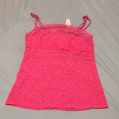 Never Worn. Pink. Picture Makes It Appear Hot Pink But It's A Normal Pink. Victoria's Secret Spring Camisole With Built-in Bra, Victoria's Secret Sleeveless Sleepwear With Built-in Bra, Fitted Lace Top With Straps, Fitted Pink Camisole With Lace Top, Pink Fitted Lace Top Camisole, Fitted Lace Top Pink Camisole, Pink Lace Top With Spaghetti Straps, Stretch Lace Tops Bra Friendly, Pink Lace Tops With Spaghetti Straps