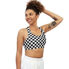 This custom sports bra is made to keep you stylishly comfy and well-supported during peak performance.  Made with 82% Microfiber Polyester and 18% Spandex, these bras strike the perfect balance between softness and stretchiness. The durable fabric delivers medium support with unique patterns making it a highly unique item for sports enthusiasts. .: Soft to the touch .: Runs true to size .: Material: 82% Microfiber Polyester 18% Spandex .: Durable and stretchy fabric (7.5 oz /yd² (250 g/m .: Assembled in the USA from globally sourced parts Racerback Sports Bra For Yoga Season, High Stretch Racerback Sports Bra, Fitted Seamless Activewear For Sports Events, Seamless Fitted Activewear For Sports Events, Racerback Crop Top For Sports With Light Support, Sports Crop Top With Light Support And Racerback, Racerback Crop Top With Light Support For Sports, Seamless Compression Activewear For Sports, Casual Supportive Breathable Sports Bra