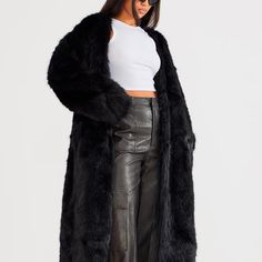 Take Your New Season Wardrobe That Extra Mile With This Black Faux Fur Collarless Coat. This Coat Includes A Black Faux Fur Material With A Collarless Design And A Relaxed Fit, What More Could You Want? Pair This Coat With Some Wide Leg Pants, Heels And Your Fave Accessories For A Look Everyone Will Want. Length Approx 114cm/45" Size 2. Brand New With Tags. I Am Happy To Answer Any Questions. Faux Fur Outerwear For Fall Party, Chic Long Faux Fur Coat, Chic Faux Fur Outerwear For Night Out, Fall Faux Fur Outerwear For Night Out, Faux Fur Outerwear For Night Out In Fall, Chic Winter Fur Coat For Night Out, Long-sleeved Outerwear With Faux Fur Lining For Night Out, Chic Black Fur Coat For Night Out, Winter Night Out Faux Fur Outerwear