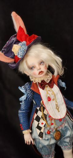 a doll with white hair and blue eyes