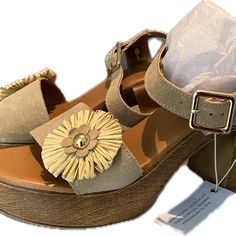 Nwt - Gorgeous And Unique Avellini Made In Italy Suede Heeled Sandals With Floral Accent - Color Beige - Gold Hardware - Size 9 Us. 3.5 Inch Block Heel With 1” Platform - Makes It Easy To Walk In!! Perfect For Summer Boho Outfits And Even Transition To Go Well With Your Fall Season!! Gives Me Those Tommy Bahama Vibes Note Slight Flaw - Small Indentation On Front Of Footbed But Not At All Noticeable When Wearing. See Pics For Details Buy Now - I Ship Out Same Business Day Beige Block Heel Wedge Sandals For Spring, Spring Suede Wedge Sandals With Block Heel, Suede Block Heel Wedge Sandals For Spring, High Heel Suede Sandals For Vacation, Beige Wedge Sandals With Stacked Heel For Spring, Suede High Heel Sandals For Vacation, Brown Suede Wedge Sandals For Spring, Spring Beige Wedge Sandals With Stacked Heel, Beige Sandals With Wooden Heel For Spring