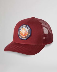 Experience the beauty our beloved national parks with our five-panel cap featuring a unique and iconic national park emblem. Breathable mesh panels and an adjustable snap back make this hat a comfortable and stylish choice for any outdoor adventure! National Park Trucker Hats: Material: Polyester & cotton. One size fits all. Care: Spot clean. Pendleton is proud to support the National Park Foundation, the official charity of America's national parks. More than $1.3 million has been contributed so far thanks to customers like you. Check out our Facebook Photos for fun and inspirational ideas on decorating any space! Don't forget to follow and like our page while you're there. 5-panel Trucker Hat With Logo Patch For Camping, Trucker Baseball Cap For Travel, Trucker Hat With Logo Patch For Outdoor Activities, Trucker Style Baseball Cap For Travel, Trucker Snapback Hat With Curved Bill For Travel, Outdoor Trucker Hat With Logo Patch, Trucker Hat With Flat Brim For Hiking, Camping Trucker Hat With Logo Patch, Trucker Baseball Cap With Logo Patch For Camping