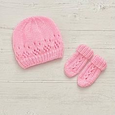 Keep your little one cosy and stylish with this adorable pink knitted hat and mittens set.Handmade with love in soft dk acrylic yarn, this set is perfect for keeping your baby warm during outdoor activities or snuggles at home.The delicate open lace design adds a touch of charm to this must have newborn accessory set, a great gift for new parents or a lovely addition to your baby's wardrobe.This beautiful set is available in two sizes, please see the size guide below. Size guide: Newborn -to fit Pink Warm Hat For Gift, Pink Knitted Hat As Gift, Pink Warm Hat As A Gift, Warm Pink Hat For Gift, Cute Pink Hand Knitted Beanie, Newborn Girl Hospital, Baby Hat And Mittens, Knitted Baby Hat, Newborn Accessories