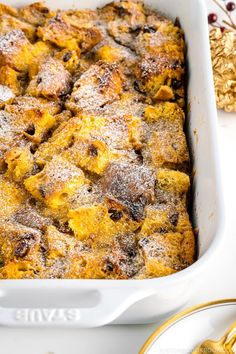 a white casserole dish filled with baked goods