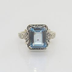 Vintage Sterling Silver Aquamarine Carved Dome Ring ....Marked 925...Total of weights 3.2grams...Size 9...Measure of Face 12.8MM...It's in very good condition. Classic Emerald-cut Topaz Ring In Sterling Silver, Vintage Silver Topaz Ring With Diamond Cut, Silver Wedding Birthstone Ring Stamped 14k, Elegant Silver Engraved Birthstone Ring, Elegant Engraved Silver Birthstone Ring, Engraved Silver Birthstone Ring, Silver Hallmarked Rings With Blue Topaz, Formal Rings With Engraved Emerald Cut, Silver Blue Topaz Hallmarked Rings