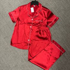 Brand New Red Silk Satin Pajamas. Size Small. Machine Washable. Short Sleeve Top And Long Pants With Elastic Waist. White Trim. 95% Polyester 5% Silk Satin Spandex. Red Short Sleeve Sets For Pajama Party, Red Short Sleeve Pajama Party Set, Red Short Sleeve Sleepwear For Pajama Party, Red Short Sleeve Sleepwear For Sleepover, Red Short Sleeve Sleepwear For Bedtime, Yellow Pajamas, Satin Pajama Set, Red Pajamas, Pyjama Satin