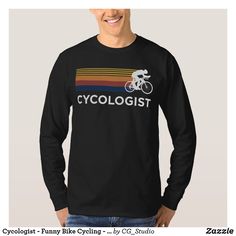 a man wearing a black shirt with the words cyclologist on it and a bicycle