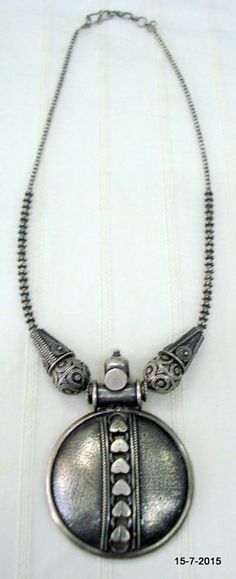 Vintage Antique tribal old silver necklace from Rajasthan India. Great handmade design, good for jewellery collection.heart. paLength - 46 cm (18.1") we can adjust the length.pendant size max. - 7.4/5 cm (2.9/1.96")weight - 66.5 grams material - silver. Antique Finish Silver Temple Necklace As Gift, Antique Silver Necklaces For Festivals, Antique Silver Engraved Temple Necklace, Silver Temple Necklace With Antique Finish As Gift, Vintage Silver Pendant Temple Necklace, Vintage Silver Necklaces For Rituals, Heavy Antique Silver Necklace, Ceremonial Silver Necklace With Antique Finish, Antique Silver Necklace For Festivals