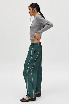 Effortless track pants from BDG. Our BDG Jess nylon track pants have an easy fit with a low rise and a relaxed straight leg. Essential track pants styling with contrasting piping at the sides. Find these staple track pants only at Urban Outfitters. Features BDG Jess nylon track pants Wide leg track pant Mid rise elasticated waistband Side pockets Piping down the legs Relaxed, straight-leg fit Full length Pull-on style UO exclusive Content + Care 100% Nylon Machine wash Imported Size + Fit Model