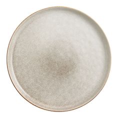 a white plate with gold rim on a white background, viewed from the top down