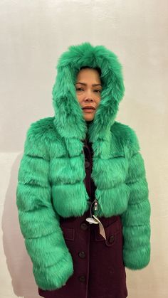 Soft, fluffy and luxurious this long sleeve faux fur jacket is cozy with a hood and has a voluminous cropped silhouette. Fully lined in black and silver-tone zip-up closure at front. Green Fur Coat, Fuzzy Coat, Green Fur, Faux Fur Jacket, Fur Jacket, Zip Up, Lime Green, Fur Coat, Faux Fur