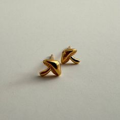 About this product Mushroom shaped mini studs •Hypoallergenic •Nickel and Lead Free Material/Size Material: 18k gold plated brass (10 times thicker than normal gold plating) Plating: 0.5 micron with e-coating for long term use Size: 5mm by 6mm Details • Made in Canada • Weight: 0.18 oz (5 g) Sensory Tools, Mini Studs, Gold Plating, 18k Gold, Stuffed Mushrooms, Gold Plate, Accessory Gift, Gift Card, Plating