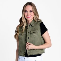 This Indigo Thread utility denim vest combines style with functionality, offering a trendy look while providing extra storage space for essentials. A versatile layering piece, this vest can be easily worn over various outfits, making it a convenient clothing piece that can be styled in different ways for any occasion. The addition of epaulettes and multiple pockets not only enhances the aesthetic appeal of the vest but also adds a touch of utility-inspired style that is currently trendy. Casual Sleeveless Denim Vest With Pockets, Casual Sleeveless Denim Vest For Work, Spring Utility Vest With Pockets, Casual Cotton Denim Vest With Pockets, Trendy Cotton Vest Outerwear, Trendy Cotton Denim Jacket For Layering, Casual Denim Vest With Pockets For Workwear, Casual Workwear Vest With Pockets, Casual Fall Vest With Pockets