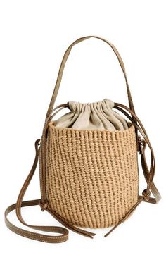 Elevate your warm-weather look with this compact basket bag designed with a drawstring lining and logo-embellished Woody strap. Drawstring closure Top carry handle; attached crossbody strap Lined Paper straw with leather trim Imported Designer Handbags This brand has B Corp certification, representing business practices with emphasis on social and environmental performance, accountability and transparency This brand meets Nordstrom Responsible Brands criteria: brand adheres to responsible social Casual Straw Bag With Removable Pouch In Natural Color, Casual Natural Straw Bag With Removable Pouch, Versatile Beige Bucket Bag, Natural Color Bucket Bag With Removable Pouch For Vacation, Spring Travel Crossbody Straw Bag, Casual Natural Straw Bag With Detachable Handle, Trendy Natural Bucket Bag With Detachable Strap, Beige Bucket Bag With Braided Handles, Beige Top Handle Straw Bag For Day Out