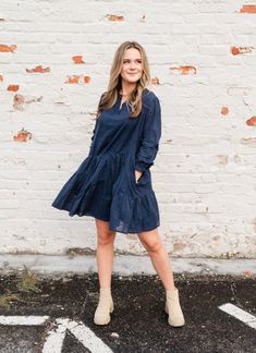 Get back to basics in our Navy Blu Dress. Crafted from breathable cotton, this loose-fitting garment is comfortable and stylish. Layer with our Ginger or Laurel Creek cardigans and pair with boots for a versatile fall outfit. Whether you're 5'2" or 5'8", you'll look and feel your best with a size that fits just right. (You won't want to miss this one!) To maintain the quality of this garment, use hand/delicate wash setting in cold with like colors; air dry; no bleach Not sure how this style will Fall Dresses In Solid Color With Relaxed Fit, Fall Dress In Solid Color With Relaxed Fit, Relaxed Fit Solid Color Fall Dress, Navy Cotton Casual Dress, Blue Cotton Dresses For Fall, Blue Cotton Dress For Fall, Casual Everyday Dresses For Fall, Casual Relaxed Fit Dress For Fall, Everyday Blue Dresses With Pockets