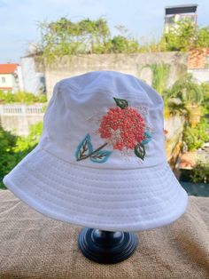 【The Idea】A great hat to give protection from the sun and rain. Available in different colors and designs. Feel free to send me a message for any custom work! 【TOTALLY HANDMADE】As we have been working on simple crafts for those who retire but are not tired, we create products that are solution-based with quality. 【SHIPPING】I use DHL eCommerce or USPS or Royal mail (depending on the destination) with tracking numbers. Buyers are responsible for any customs and import taxes that may apply. I don't White Cotton Vacation Hat, Adjustable Sun Hat For Spring Gift, Brimmed Sun Hat For Spring, Trendy White Brimmed Bucket Hat, Spring Gift Adjustable Sun Hat, Cute Cotton Bucket Hat For Summer, Cute Summer Cotton Bucket Hat, White Handmade Bucket Hat, Casual Embroidered Sun Hat For Summer