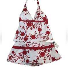 White With Red Floral Print 2 Piece Swimsuit From Jantzen. Halter Style Top With Light Padding. Bottom Is Skirt Style With Side Split. Nwt. Size 12 Red Printed Tankini For Summer, Red Tankini For Spring Vacation, Red Tankini For Vacation In Spring, Red Tankini For Swimming In Spring, Holiday Fitted Printed Swimwear, Red Floral Print Sleeveless Swimwear, Fitted Tankini For Summer Holiday, Red Halter Neck Tankini For Summer, Red Fitted Summer Tankini