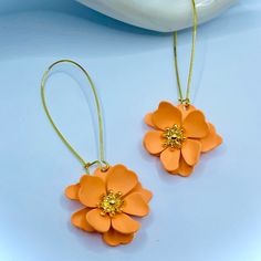 These Adorable Earrings Are Perfect For A Summer Event, Vacation Or Just To Wear At Any Time, Gold Plated Ear Hooks And Orange/Coral Flower Earrings With A Drop Of Almost 3 Inches. Orange Flower-shaped Adjustable Earrings, Orange Adjustable Dangle Flower Earrings, Nickel-free Orange Flower Earrings, Orange Flower Earrings For Gift, Orange Flower-shaped Earrings For Gift, Orange Dangle Flower Earrings Gift, Orange Dangle Flower Earrings For Gift, Orange Dangle Flower Earrings With Ear Wire, Orange Drop Earrings For Gift