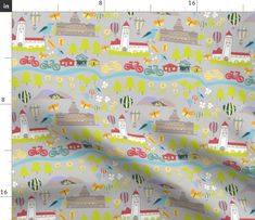 the fabric is very colorful and has many different designs on it, including lighthouses