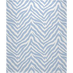 a blue and white rug with zebra print