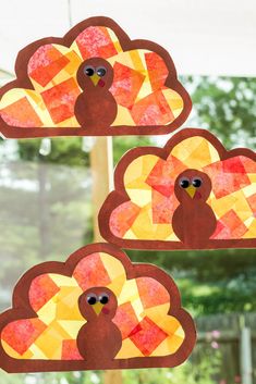 three turkeys made out of construction paper