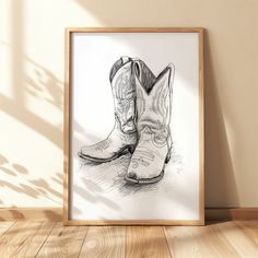 a drawing of a pair of cowboy boots on the floor in front of a wall