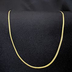 This 22k gold herringbone chain necklace is a stunning piece in herringbone design, crafted from solid gold, offers a smooth and luxurious feel that elegantly drapes around the neck. With its timeless appeal and rich golden hue, this necklace is perfect for both everyday wear and special occasions.  Material: Genuine 22K solid gold Weight: 3.79 grams Length:15 inches Necklace closure: M clasp Available weight: 7.58 g/ 15.16 g/ 30.32 g (length depends on weight) We offer a 100% buyback guarantee, ensuring you receive the full value of your gold based on the current market rate. Classic Yellow Gold Snake Chain Necklace, Yellow Gold Snake Chain Necklace, Gold Herringbone Necklace With Box Chain For Formal Occasions, Classic Gold Snake Chain Necklace For Formal Occasions, Classic Gold Herringbone Necklace With Curb Chain, Yellow Gold Plated Herringbone Necklace With Box Chain, Gold Plated Yellow Gold Herringbone Necklace With Box Chain, Yellow Gold Plated Herringbone Necklace With Gold Chain, Yellow Gold Herringbone Necklace With Box Chain