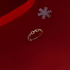 The Open Link Ring has a sensational design with the elegantly embroidered oval chains embellished and connected with glittering stones which will shine like the brilliance of a constellation. - Made in 10k or 14k solid gold - Decorated with handset white cubic zirconia stone - Band Width: 3.36 mm / 0.13 inches - Thickness: 1.00 mm / 0.03 inches -This product comes with iconic Norm Jewels gift box Twisted Gold Ring, Link Ring, Luxury Jewelry Brands, Gold Link Chain, Solid Gold Band, Nail Ring, Linking Rings, Half Eternity Ring, Diamond Star