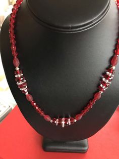 This unique red and white striped clear glass faceted bead necklace has three sections of mixed beads including mat red glass beads and clear disk beads with silver spacers. The fun necklace is beautifully strung. The larger beads are 12mm with the smaller ones in the back being 5mm. The necklace is 18 1/2 inches long. I specialize in finding fun wearable jewelry. Please browse my shop for more fun options. I box sales ready to be given as gifts. I often combine multiple item purchases to save o Mixed Bead Necklace, Mixed Beads Necklace, I Box, Wearable Jewelry, Faceted Bead Necklace, Cool Necklaces, Faceted Glass, Red And White Stripes, Red Glass